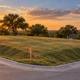 Survey stakes on a city corner lot in Dallas before construction